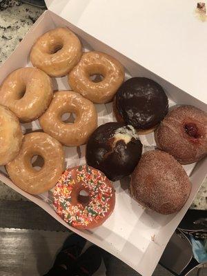 Our to-go doughnuts for just a little over $10 (my bro already ate the missing one LOL)