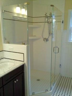 Custom shower enclosure by Glass Works.