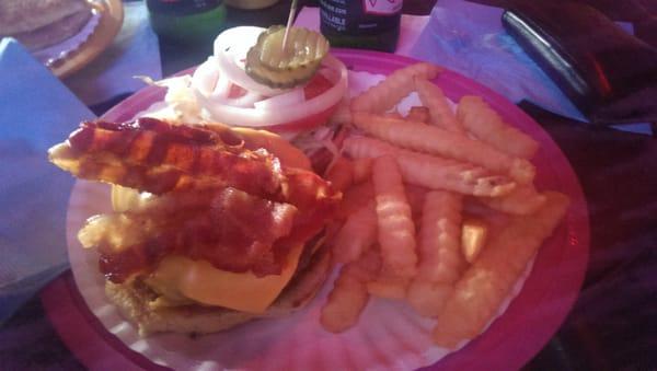 Double bacon cheese burger with fries.