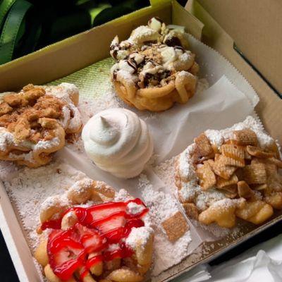 top left butter crunch, top right smores, bottom left strawberry, and bottom right cinnamon toast crunch