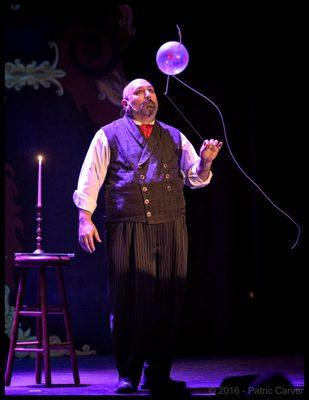 Paul performing his Gypsy Balloon Trick on stage at The Great Star Theater. 2016