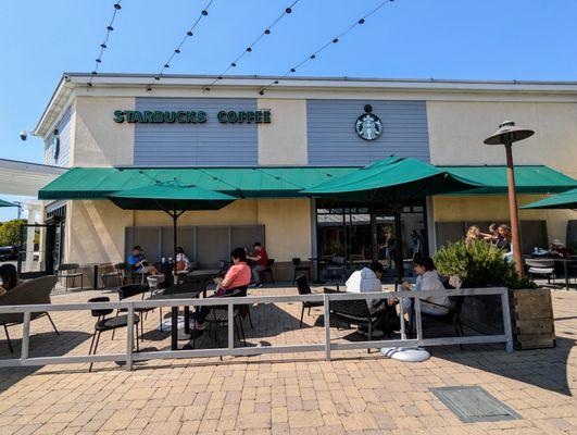 Outside. Storefront, side entrance, and outdoor patio. Located at South Shore Center in Alameda.