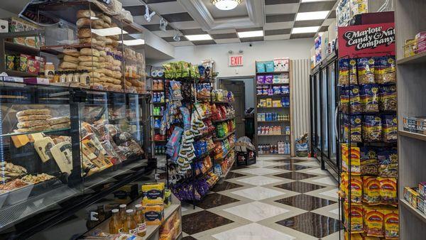 Looking inside the Dyker Natural Deli.  Well stocked and super bright and clean.