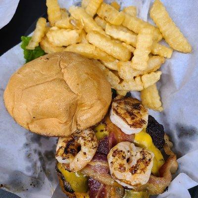 Our Salty cowboy burger.  1/2 beef, with cheese, bacon and Cajun shrimp.  Yum!