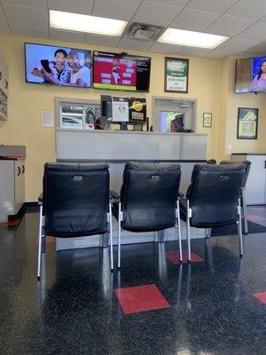 Counter with chairs set up for distancing purposes