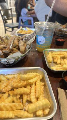 Plates of wings and fries - Flavas Tampa