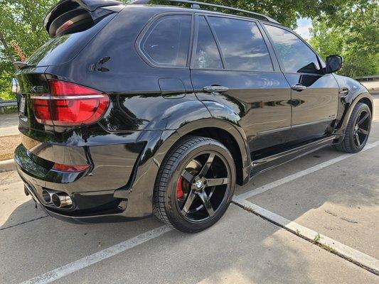 2013 BMW X5 35i with Hamann wide body kin installed.