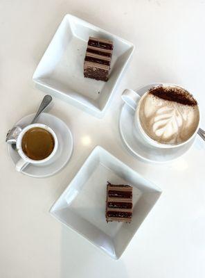 Mocha and espresso accompanied by raspberry chocolate cake