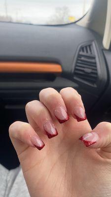 Red sparkly french tips nails