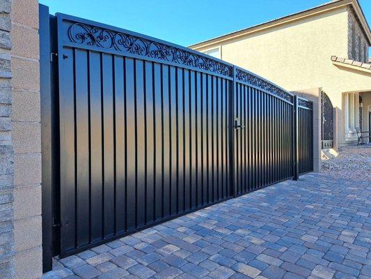 18' Wide RV Gate with a panel. Simple Elegant Style. Total privacy with double arch and scrolls along the top.