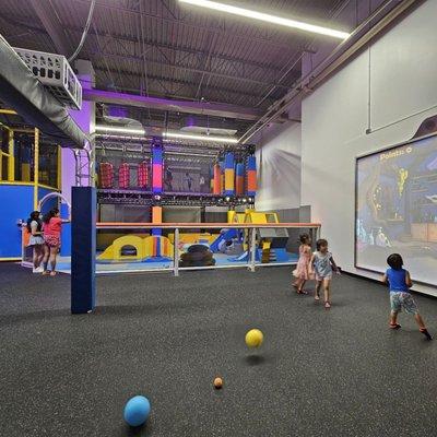 Toddler soft play area straight ahead for 4 and under and interactive multiball screen to the right.