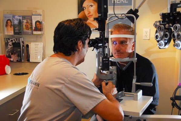 Dr. Benjamin Examining the patient at the slitlamp at Benjamin Eye Institute