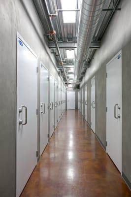 Vault storage-double lock doors behind a coded, re-enforced steel door.