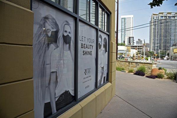 Window graphics make downtown business stand out from the hustle and bustle!