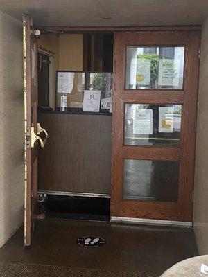 This is the office... a doorway in a homeless hotel shelter.