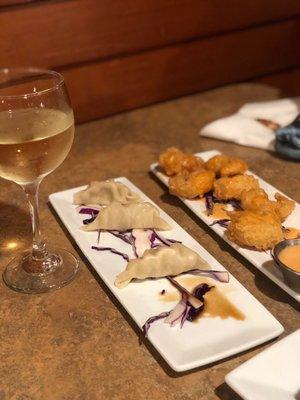 Apps: Potstickers, spicy shrimp, and wine (great pour for price)