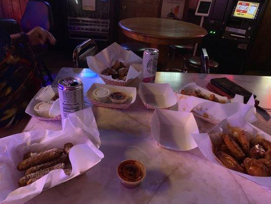 White claws, fabulous wings, mozzarella sticks and toasted  ravs with plenty of sauces!