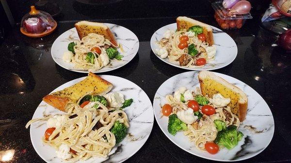 Private dinner chicken alfredo and vegetable alfredo.