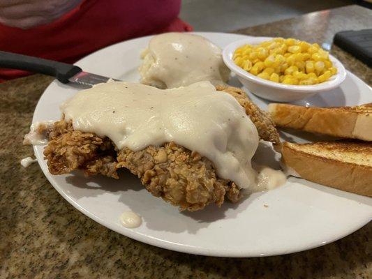 Chicken fried steak, corn, mashed potatoes and Texas toast.