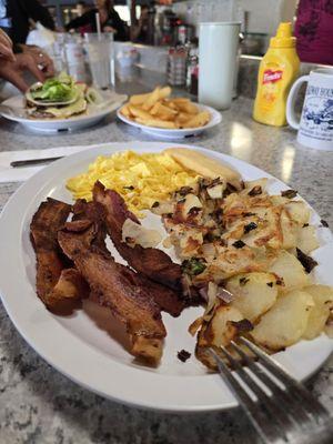 2 egg breakfast with country potatoes. 4 out of 5 stars. Not bad.