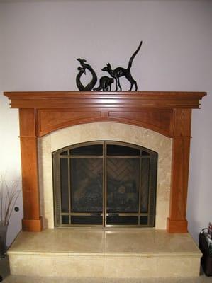 Direct vent gas Fireplace with travertine and a mantle