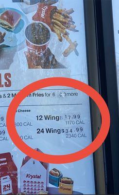 Twelve wings listed for $17.99 on multiple locations on the drive-thru menu.