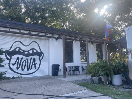 Outdoor seating and food truck to the right. LGBTQ folks welcomed!