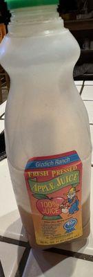 Expanded container of 6-Days expired (when sold) Gizdich Ranch 32 oz. Apple Juice.