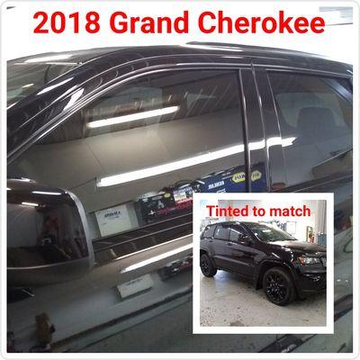 2018 Jeep Grand Cherokee: 2 front windows tinted to match