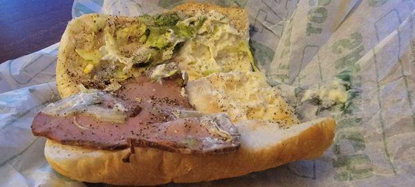 My 6 inch roast beef sandwich. It had half of a slice of roast beef and I don't even know what the rest of that is.