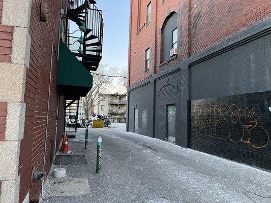 Small alleyway to parking