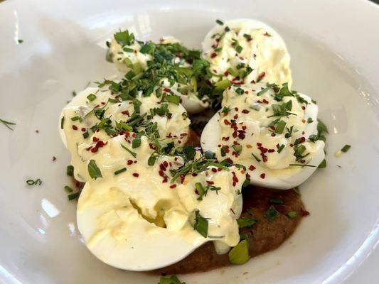 Deviled eggs on bacon jam