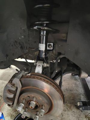 Remplace Front strut assambly