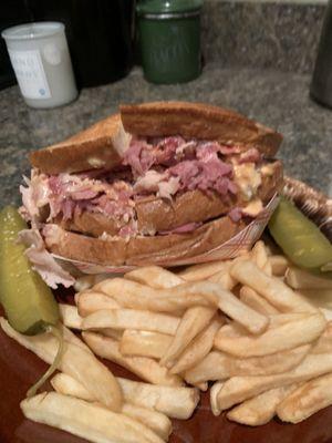 Regular turkey/corn beef twister with Swiss and regular Russian dressing on toasted rye with fries and 2 dill deli pickle spears