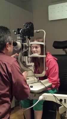 Dr. Hirano providing a comprehensive, superior quality eye exam. We care about you and the health of your eyes!