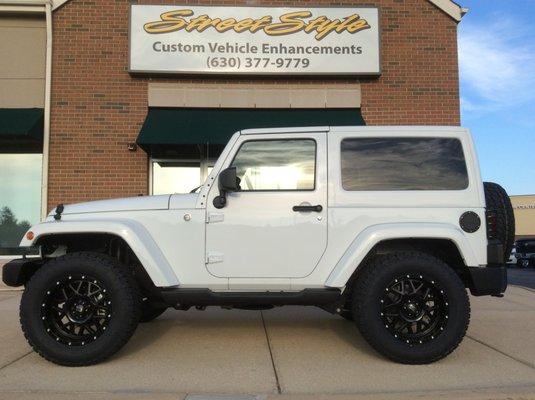 STREETSTYLE  lifted Jeep Wrangler with tire/wheel upgrade.