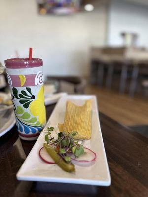 Very tasty chicken tamale with salsa verde, super moist and flavorful. They don't skimp on the meat.