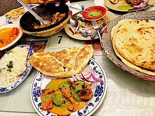 Chicken tikka masala, chicken karahi, long grain rice, naan, mint chutney.