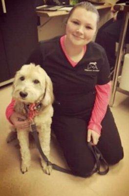 One of our fabulous technicians, Kayla, with one of our fabulous patients!