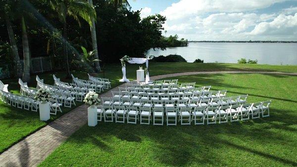 Ceremony setting at white orchid wedding venue