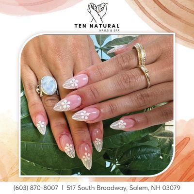 Flaunt elegance with our floral-inspired French tip nails!  
 : https://lk.macmarketing.us/TenNaturalNailsAndSpa-Booking