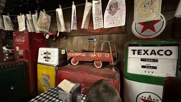 Old gas pumps and model fire truck