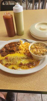 Cheese enchiladas with carne guisada rice and beens.