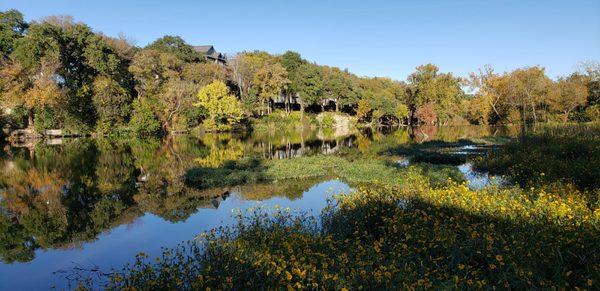 Pretty reflections of fall color, looking downstream toward the dam