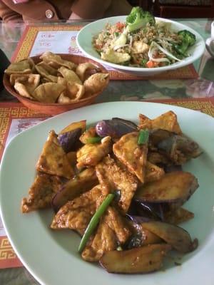 Tofu dish with sauce and vegetables, above is a fried rice dish with raw vegetables made for guest (not on menue)