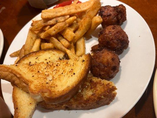 Fries, hush puppies, garlic toast, and corn bread (fixed GOOD)