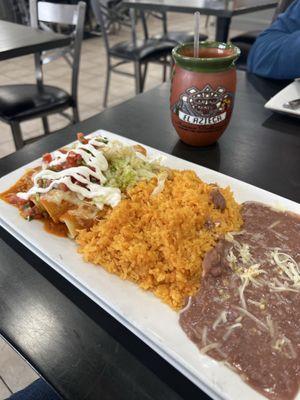 Enchiladas rojas y horchata in the Mexican clay cup