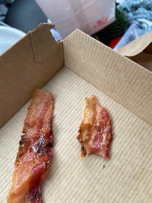 two snacking bacon pieces with a side of hair