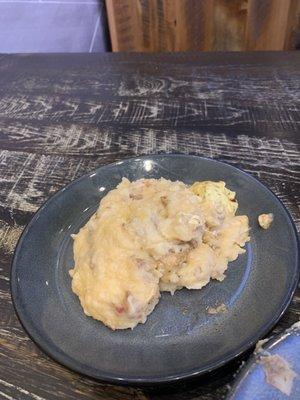 Loaded mashed potatoes have the consistency of glue and a fake bacon flavor.