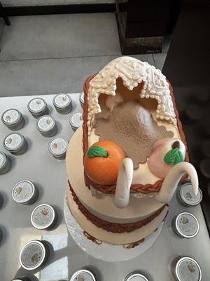 Baby Shower cake sweet earth tones w orange (FL), peach (GA) & covered baby in carriage.